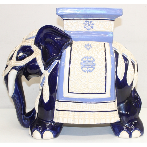 1641 - A large pottery garden seat or jardinière stand formed as an elephant, approx 41cm tall