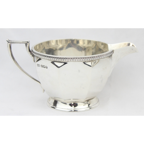 1025 - A silver 3 piece coffee set with fine gadrooned borders, marked for Sheffield 1937 & 1939 by Harriso... 