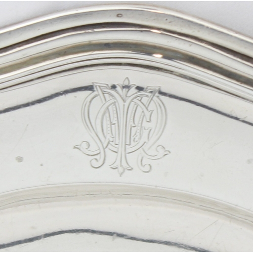 1028 - An antique French silver plate or salver with engraved crest, French silver export marked for 950 si... 