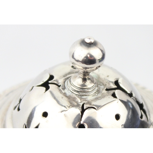 1059 - A George III period silver sugar castor, marked for London 1809 by Thomas James, approx 15cm tall, a... 