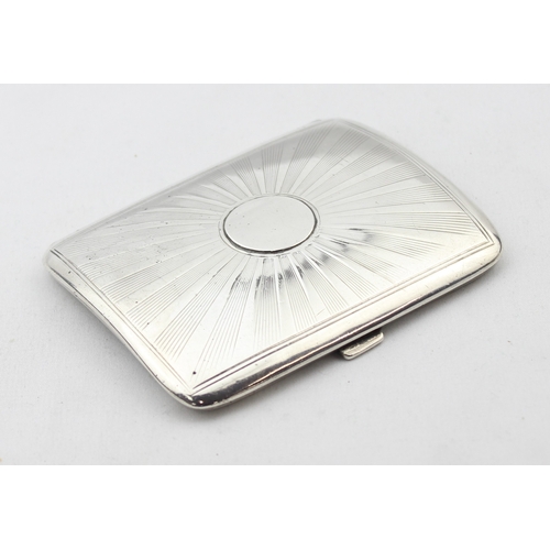 1071 - An Edwardian curved silver card case with sunburst decoration, Chester 1903 by Walker & Hall, approx... 