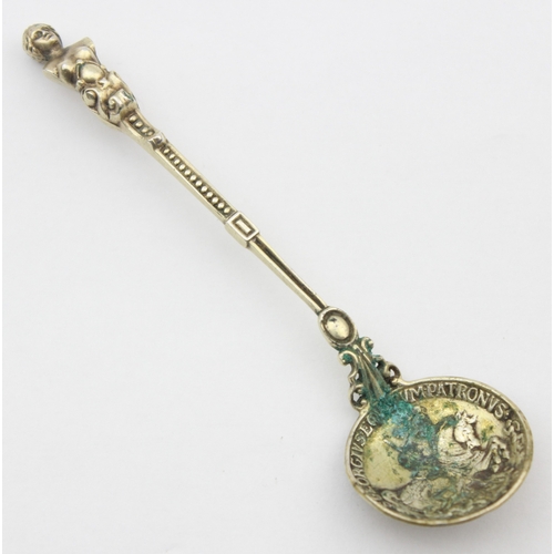 1091 - A vintage silver mate spoon straw, marked Sterling and XRF confirmed, a silver gilt spoon with St Ge... 