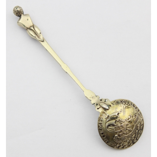 1091 - A vintage silver mate spoon straw, marked Sterling and XRF confirmed, a silver gilt spoon with St Ge... 