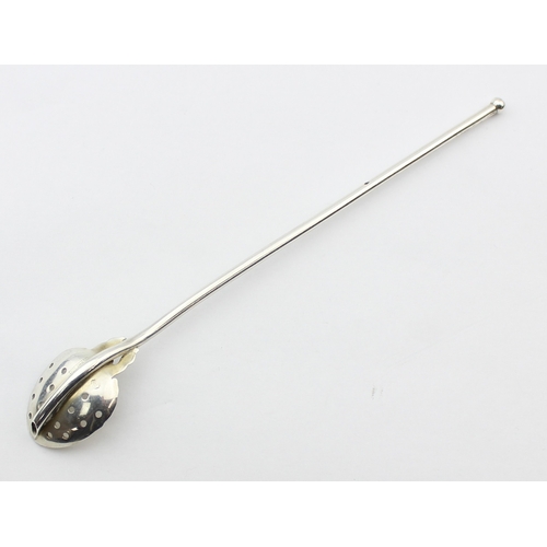 1091 - A vintage silver mate spoon straw, marked Sterling and XRF confirmed, a silver gilt spoon with St Ge... 