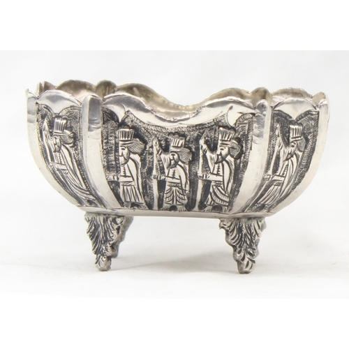 1092 - A vintage silver bowl embossed with scenes of a royal procession, indistinctly marked to base but li... 