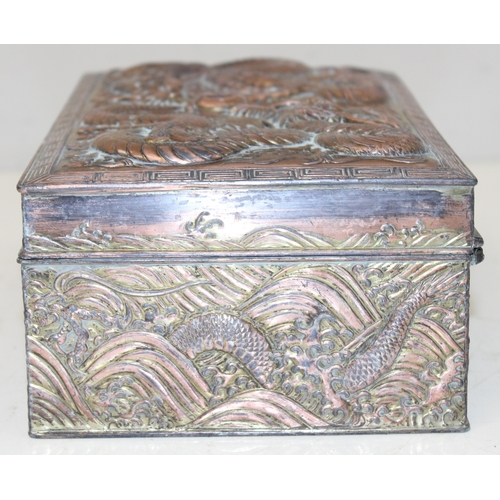 1047 - An Oriental silver plated or antimony jewellery casket decorated with dragons, unusual large size, a... 