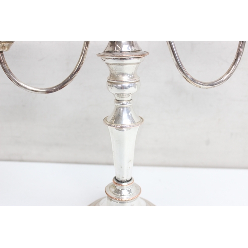 1048 - 2 pair of silver-plated 3-branch metamorphic candelabras, the largest approx 30cm H