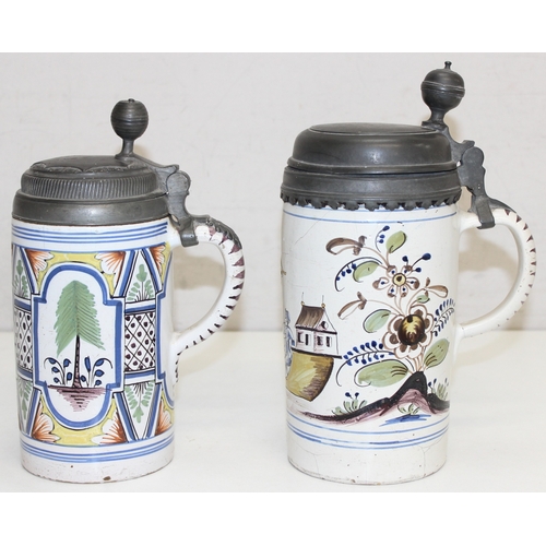 1493 - 2 18th century German faience pottery and pewter steins or lidded tankards, one dated 1749 depicting... 