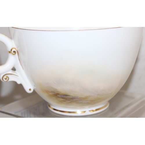 1497 - Royal Worcester, a vintage breakfast cup of large or oversize proportions depicting a partially hand... 