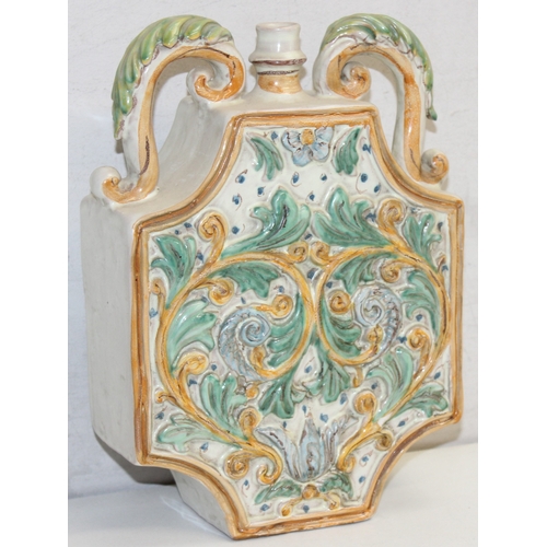 1498 - An Italian majolica (maiolica) style 2 handled releif decorated vase or vessel, marked to the back 