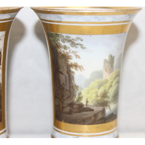 1500 - A pair of miniature Barr, Flight & Barr period Worcester vases each decorated with a landscape vigne... 