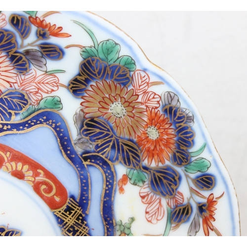 1502 - A set of 10 Oriental imrai decorated porcelain side plates, each bearing 6 character Chinese Ming Dy... 