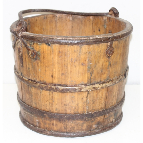 286 - Antique wooden water pale/bucket with iron attachments and banding, possibly Chinese, approx 34cm di... 