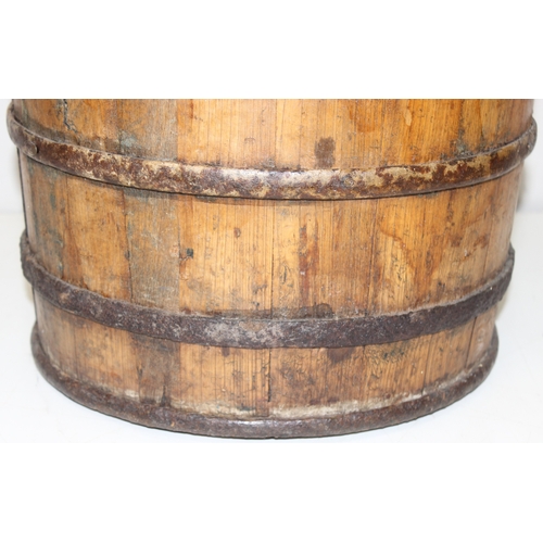 286 - Antique wooden water pale/bucket with iron attachments and banding, possibly Chinese, approx 34cm di... 