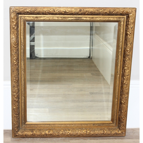 367 - An antique gilt framed wall mirror with bevelled glass panel, approx 85cm x 75cm