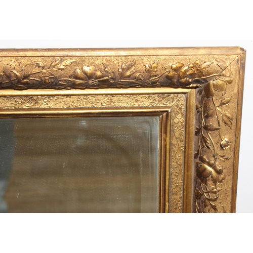 367 - An antique gilt framed wall mirror with bevelled glass panel, approx 85cm x 75cm