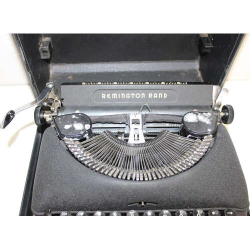 720 - 3 vintage typewriters in carry cases, to incl a Remington Rand Deluxe Model 5, Olivetti Lettera 22 a... 