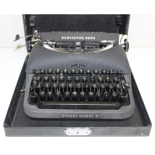 720 - 3 vintage typewriters in carry cases, to incl a Remington Rand Deluxe Model 5, Olivetti Lettera 22 a... 