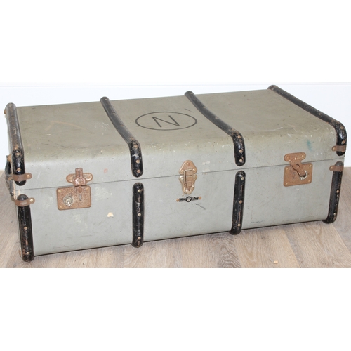 110 - 2 vintage canvas shipping trunks with wooden ribs, some labels, one brown and the other a green/grey... 