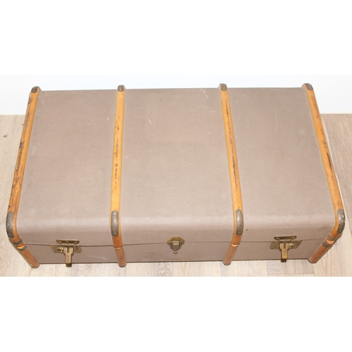 109 - 2 vintage trunks, one a wooden slatted and canvas lined example and a wooden one named to Lt. Col A.... 