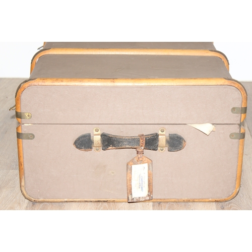 109 - 2 vintage trunks, one a wooden slatted and canvas lined example and a wooden one named to Lt. Col A.... 