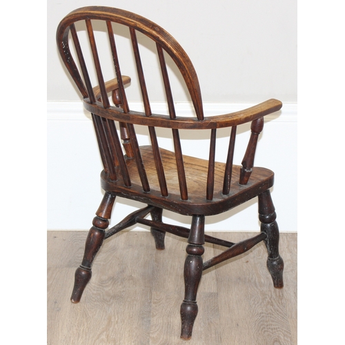 41 - An antique miniature Windsor hoop back farmhouse armchair, child's size, approx 44cm wide x 71cm tal... 