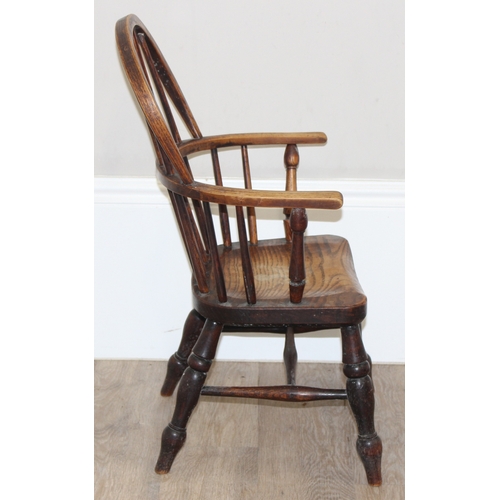 41 - An antique miniature Windsor hoop back farmhouse armchair, child's size, approx 44cm wide x 71cm tal... 