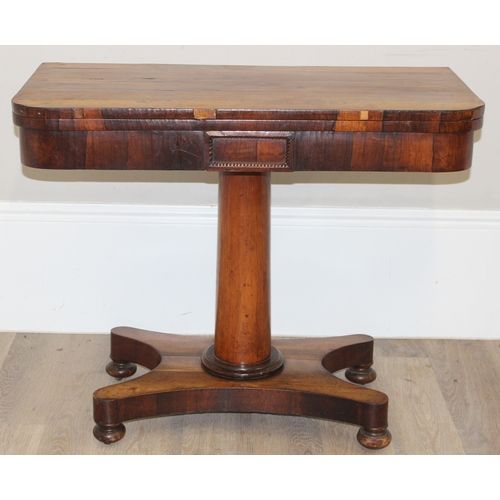 40 - A Victorian Rosewood card table with foldover top and green baize lined interior, approx 92cm wide x... 