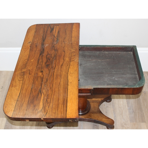 40 - A Victorian Rosewood card table with foldover top and green baize lined interior, approx 92cm wide x... 