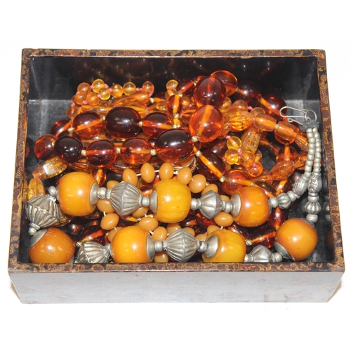 1158 - A number of vintage and later amber effect bead necklaces and other jewellery