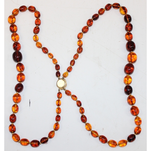 1158 - A number of vintage and later amber effect bead necklaces and other jewellery