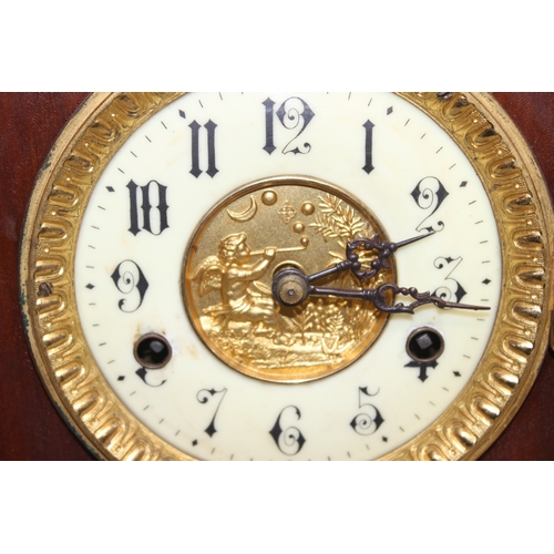 1368 - An early 20th century mahogany cased mantle clock with mechanical movement, key and pendulum, approx... 