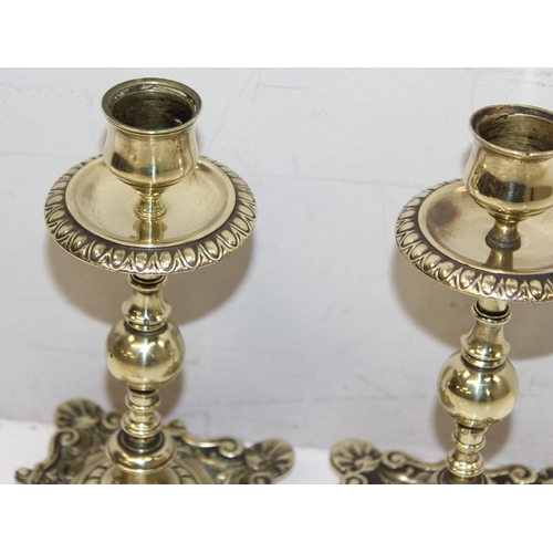 1628 - Pair of small antique ornate brass candle sticks, approx 17cm