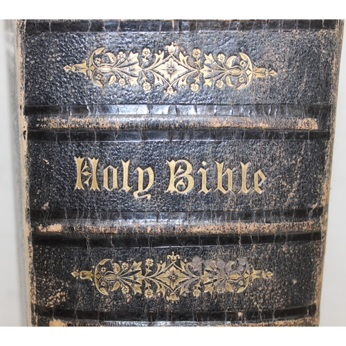 542 - An extremely large 19th century leather bound family bible with illustrations, published by James Sa... 