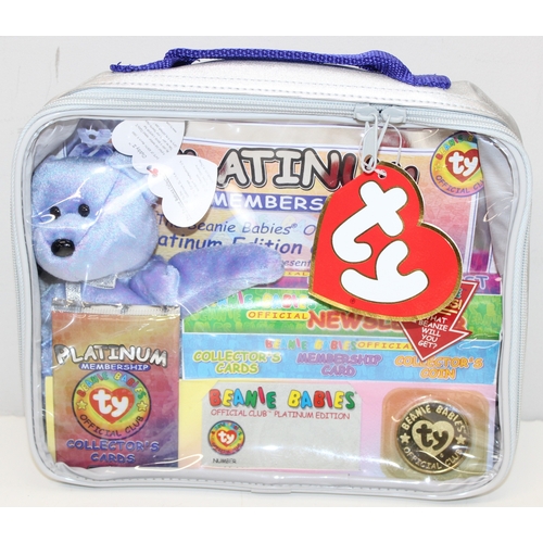 614 - Qty of vintage Beanie Baby teddy bears, related magazines, official club bag and TY heart protectors