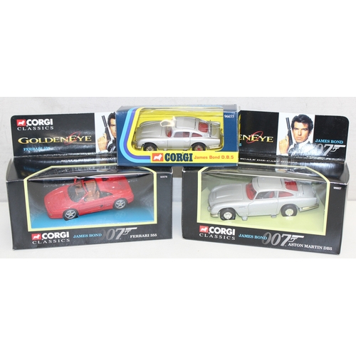 618 - 3 boxed Corgi James Bond themed die-cast vehicles to incl Ferrari 355 and 2 Aston Martin DB5