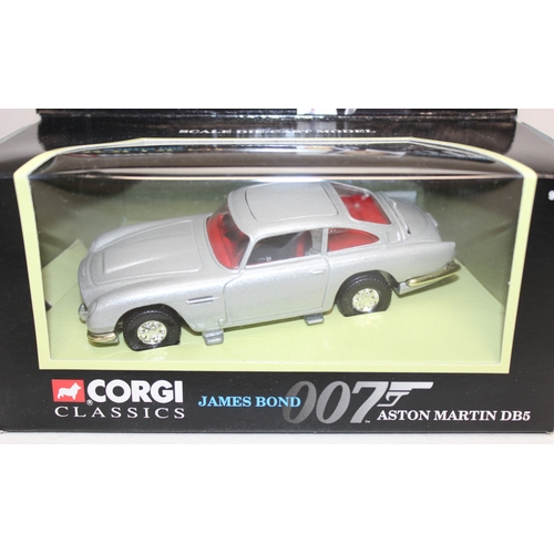 618 - 3 boxed Corgi James Bond themed die-cast vehicles to incl Ferrari 355 and 2 Aston Martin DB5