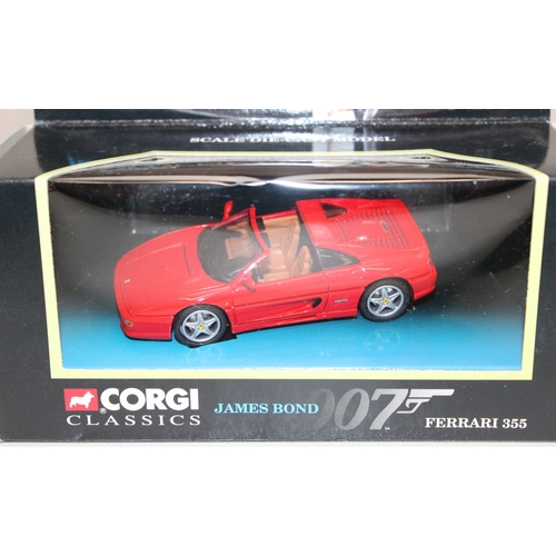 618 - 3 boxed Corgi James Bond themed die-cast vehicles to incl Ferrari 355 and 2 Aston Martin DB5