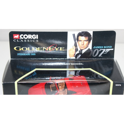 618 - 3 boxed Corgi James Bond themed die-cast vehicles to incl Ferrari 355 and 2 Aston Martin DB5