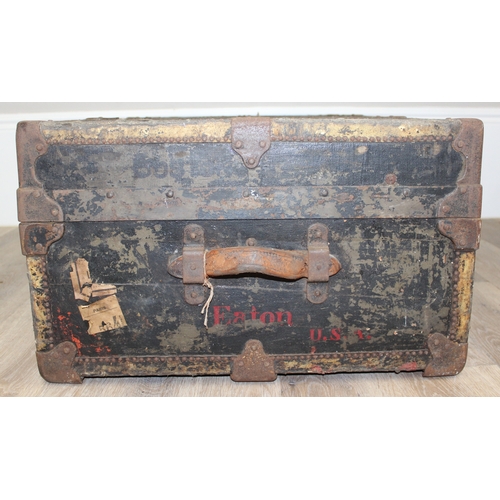 104 - A vintage black painted shipping trunk by Henry Likly of Rochester, New York, early 20th century, ap... 