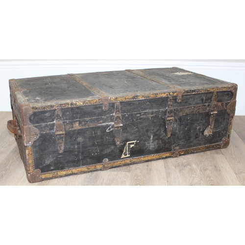 104 - A vintage black painted shipping trunk by Henry Likly of Rochester, New York, early 20th century, ap... 