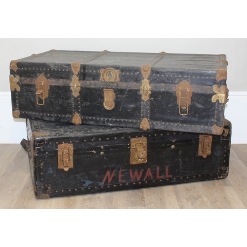 105 - 2 vintage black shipping trunks with metal bound corners, both without makers marks, the largest app... 