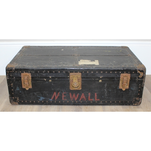 105 - 2 vintage black shipping trunks with metal bound corners, both without makers marks, the largest app... 