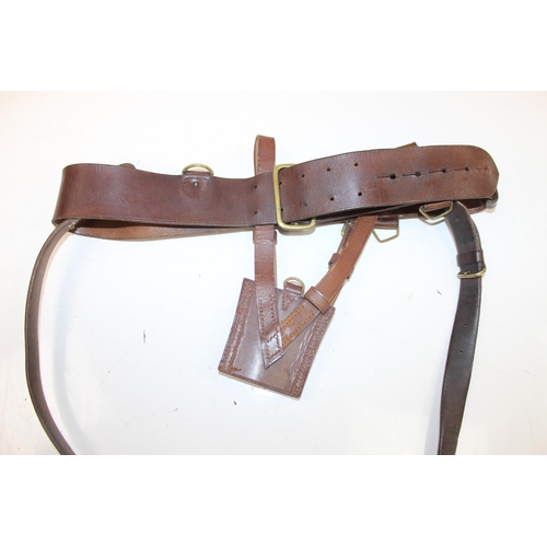 1447 - A vintage military officer's Sam Brown leather-belt with pistol holster and sword hanger