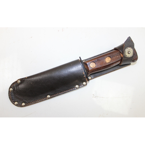 1449H - British Army 1984 Survival Knife Type D, handle stamped with military crows foot mark, with sheath, ... 