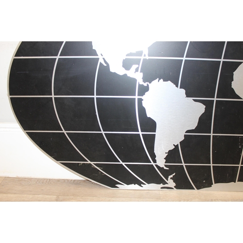 387 - A large black and aluminium wall map of the globe, Robinson projection, approx 232cm x 104cm