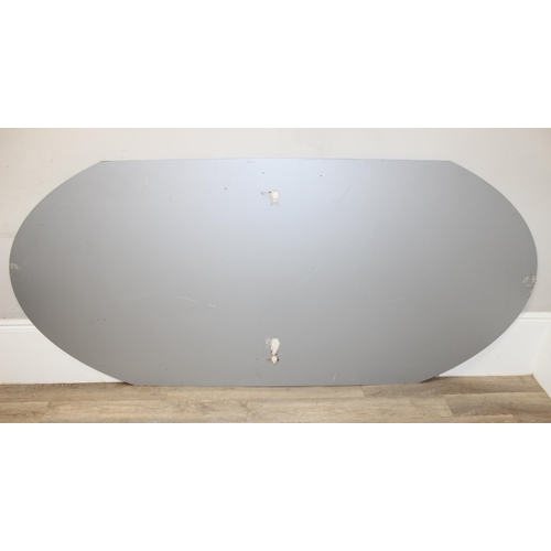 387 - A large black and aluminium wall map of the globe, Robinson projection, approx 232cm x 104cm