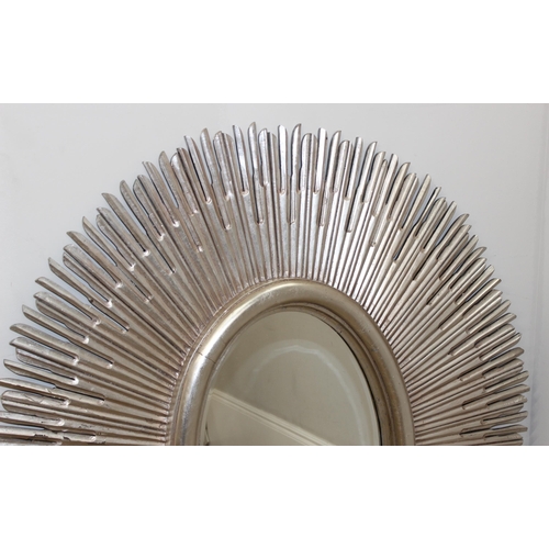 388 - A large silver coloured retro style sunburst mirror, approx 146cm x 132cm