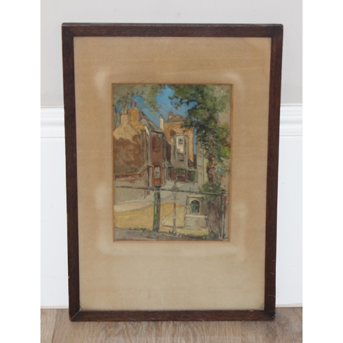 390 - An antique watercolour of a street scene in oak frame, indistinctly signed in pencil lower left, pos... 