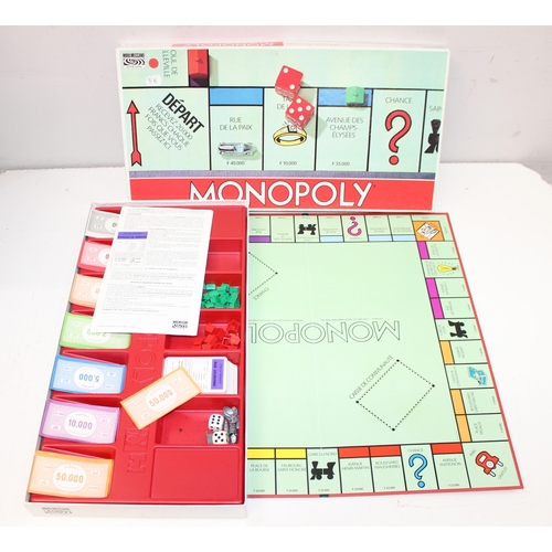 638 - 8 various Monopoly games to include French, Spanish and Egyptian editions along with travel versions